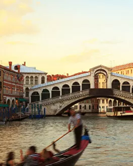 Single-Arched Rialto Bridge Collection: Gondolier near Rialto bridge, Venice, Italy