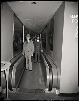 Officials Prints: Goodrich Officials on Moving Sidewalk