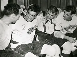 Gordie Howe and Teammates Hug After Victory