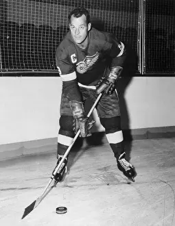 Gordon Howe on Ice With Puck
