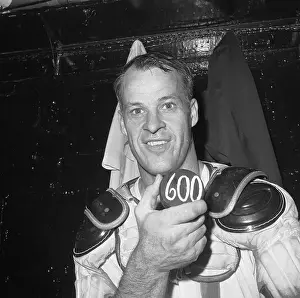 Gordon Howe Smiles With 600th Goal Puck