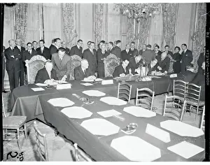 Government Delegates Signing a Document