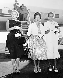 Grace Kelly with Elizabeth Taylor and Laraine Day at Airport