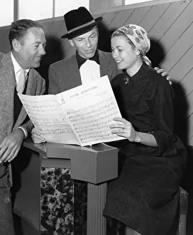 Grace Kelly and Frank Sinatra Reading Music Notes