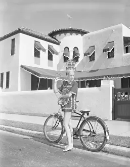 Grace Kelly Posing by Bicyle