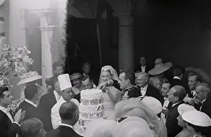Grace Kelly and Prince Rainier Cutting Their Wedding Cake
