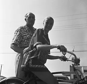 Bicycling Prints: Grace Kelly Riding Bicycle With Prince of Monaco
