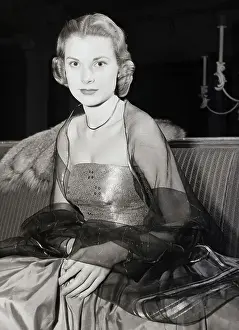 Grace Kelly Seated On Couch In Evening G
