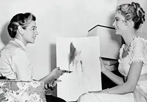 Grace Kelly Talking To Designer; Seated
