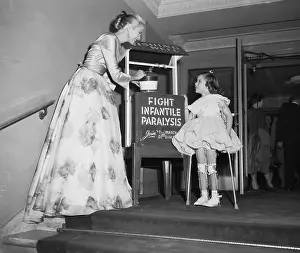 Grace Kelly Talking With Young March of Dimes Representative