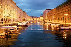 Harbor Gallery: Grand canal with boats at night in Trieste, Italy