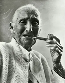 Grandma Martha Weeks Puffing on Pipe