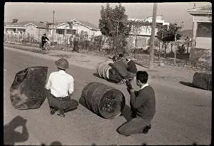 Ethnic Prints: Greek Solders Duck Behind Barrels with Rifles