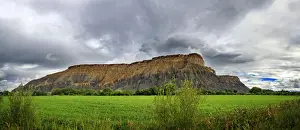Green Light Prints: Green fertile valley with the South Caineville Mesa after a thunderstorm