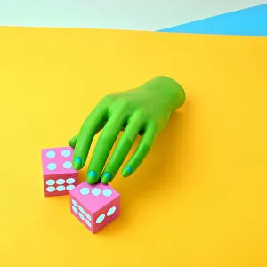 Images Dated 24th January 2017: Green Mannequin Hand With Dice