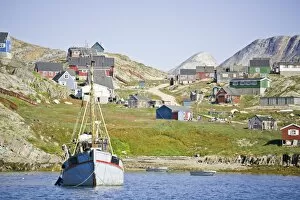 Greenland, Kulusuk, fishing boat anchored near shore