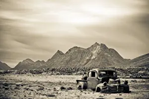 Wreck Prints: Greenland, Tasiilaq, abandoned truck and fuel barrels from US Airforce base at Ikateq
