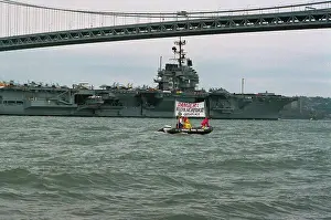 Greenpeace Activists Displaying Banner from Watercraft