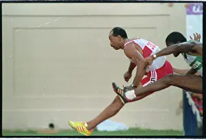 Durham Prints: Greg Foster Setting Record in Hurdles