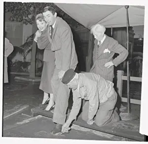 Gregory Peck and Ann Baxter Placing Their Feet in Cement