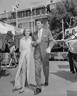 Gregory Peck and Lauren Bacall Walking Arm in Arm