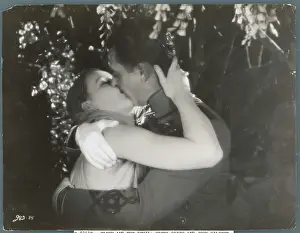 Prints of Flesh and the Devil'--Greta Garbo and John Gilbert in kissing scene. Movie still, 1927 Timeless Elegance: The Iconic Greta Garbo Collection: Greta Garbo and John Gilbert