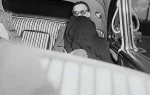 Greta Garbo in back of Limousine