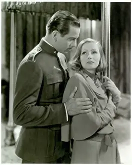 Prints of (Original Caption). Greta Garbo and unidentified leading man in an film still Timeless Elegance: The Iconic Greta Garbo Collection: Greta Garbo and Man