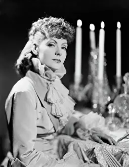 Prints of From the 1935 film Anna Karenina Timeless Elegance: The Iconic Greta Garbo Collection: Greta Garbo At Table; Candelabra; Movie