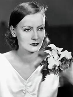Orchid Prints: Greta Garbo Wearing Orchid On Shoulder