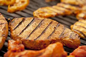 Breast Prints: Grilled meat, marinated turkey breast and beef steaks on a grill