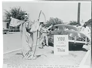 Bexar County Prints: The Grim Reaper Standing Next to a Car