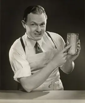 Grocer explaining label on product