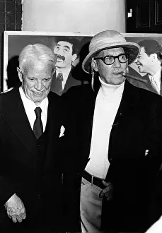 Prints of LOS ANGELES - CIRCA 1975: Film comedy icons Groucho Marx and Charlie Chaplin attend an event celebrating the Marx Briothers circa 1975 in Los Angeles, California Master of Mime, Icon of Cinema: Chaplin in Prints: Groucho And Charlie