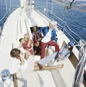 Images Dated 3rd July 2011: Group of friends in sailing boat