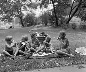 Shorts Prints: Group of girls (6-7) and boys (8-9) in picnic