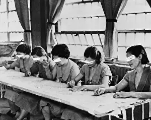 Group of Inmate Sewing