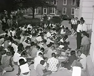 Sit In Prints: Group Kneeling in Prayer