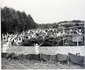 Hillside Prints: Group Looking Up Hillside Raising Arms