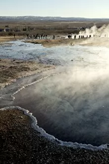 Group of people at Geysir of Southern region in Iceland