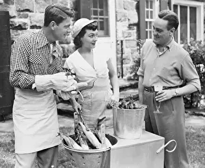 Corn Prints: Group Preparing Corn For Cooking