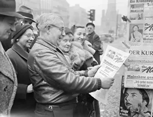 West German Prints: Group Reading Newspaper