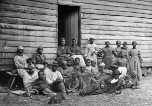 Slavery Prints: Group of Slaves Outside Cabin