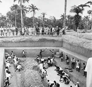 Group Watching Workers in Diamond Mine