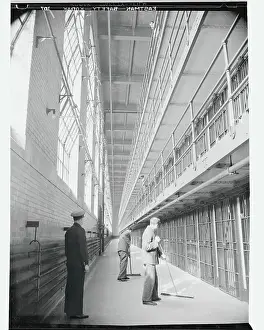 Discipline Prints: Guard and Prisoners Cleaning Cell Floor