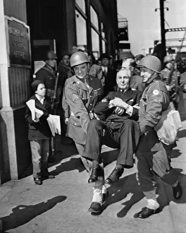 Nonconformity Prints: Guards Removing Sewell Avery in Chair from Building
