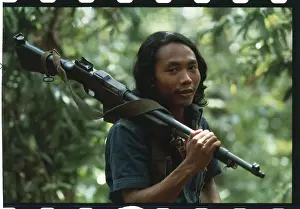Guerrilla Holding His Weapon
