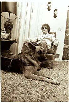 Guide Dog Advocate Sitting with His Companion
