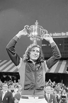 Guillermo Vilas Holding U.S. Open Trophy