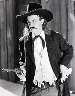 Gun Wielding Cowboy Of The Old West